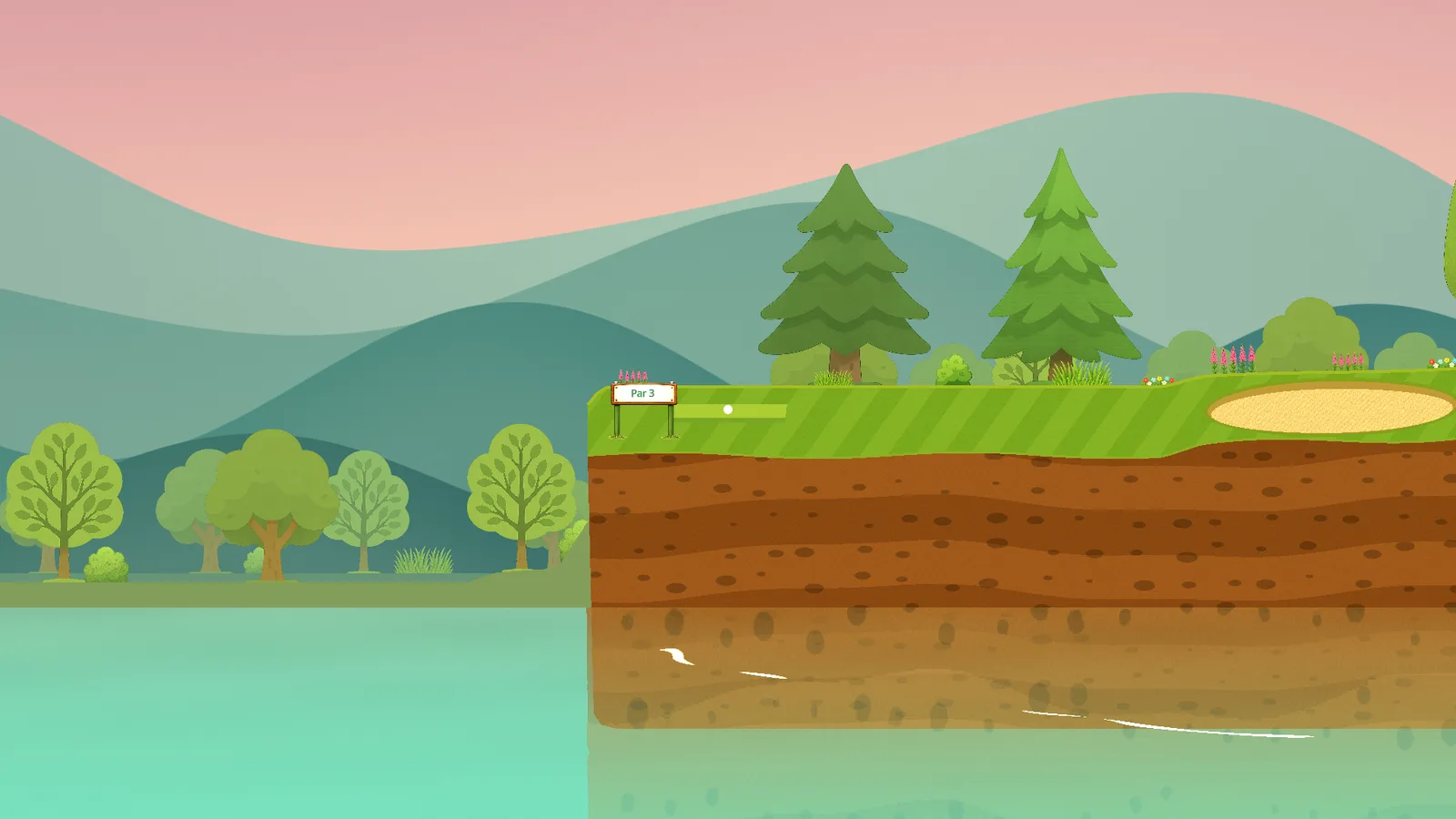 A tee box on a grassy bank above a calm lake at sunrise